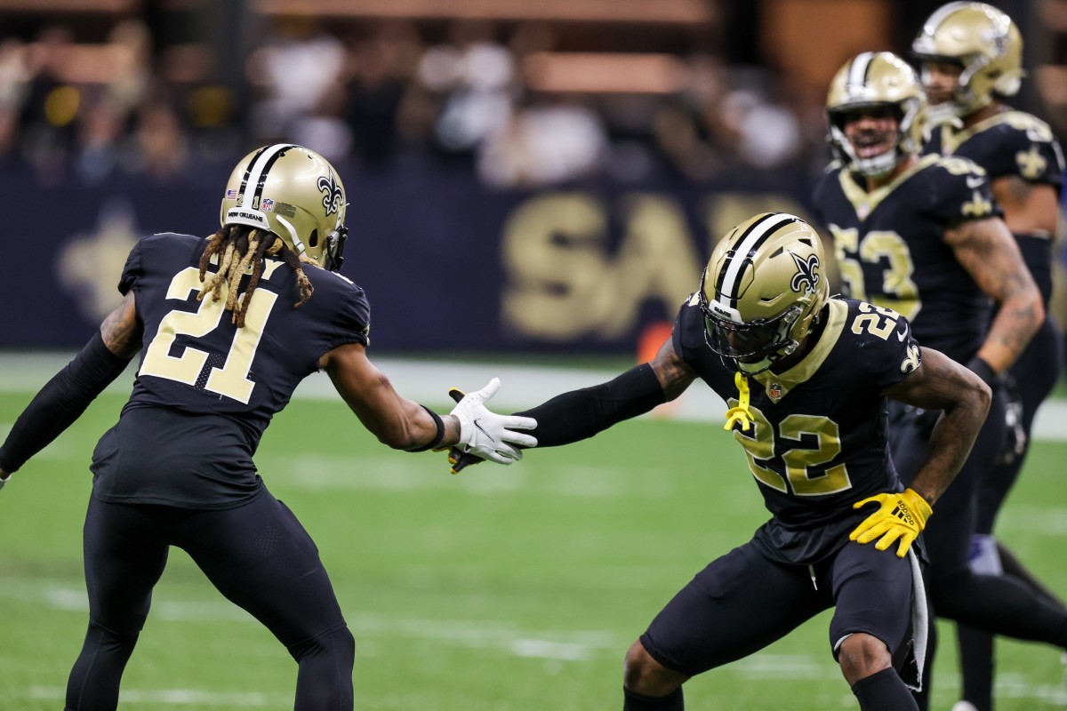 New Orleans Saints cornerback Bradley Roby (21) celebrates with defensive back Chauncey Gardner-Johnson (22). Mandatory Credit: Stephen Lew-USA TODAY Sports